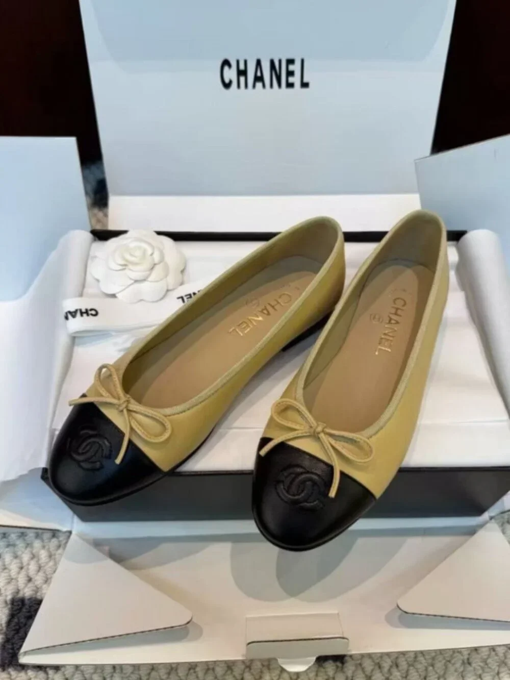 CHANEL Two-Tone Leather Embossed CC Bow Round Toe Ballet Flats